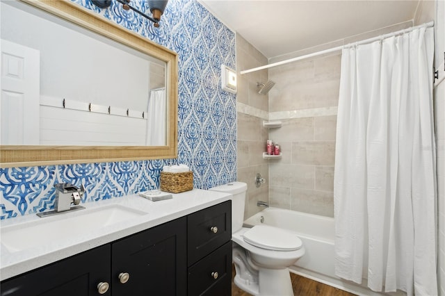 full bathroom featuring hardwood / wood-style floors, vanity, toilet, shower / bathtub combination with curtain, and tasteful backsplash