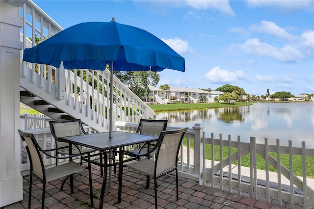 view of patio / terrace featuring a water view