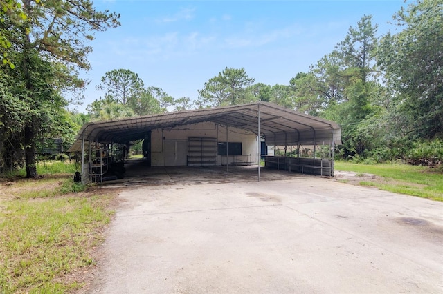 view of parking / parking lot with a carport