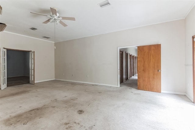 empty room featuring crown molding and ceiling fan