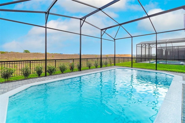 view of pool with a lanai