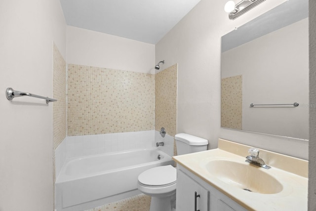 full bathroom featuring toilet, vanity, and tiled shower / bath combo