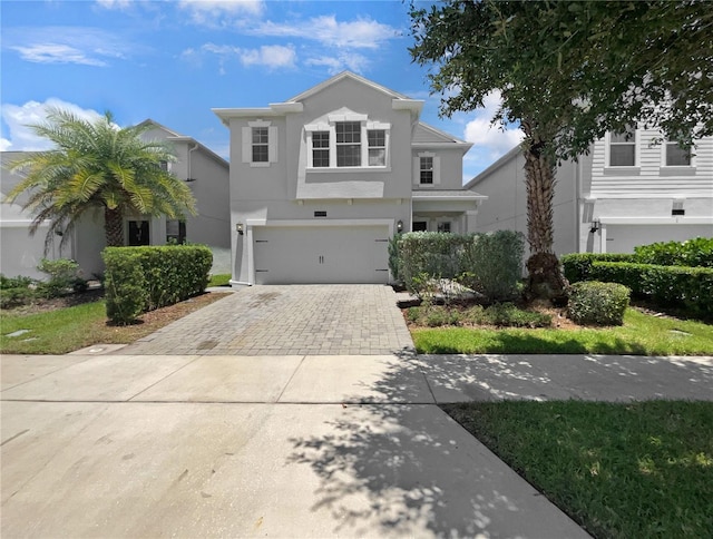 front of property featuring a garage