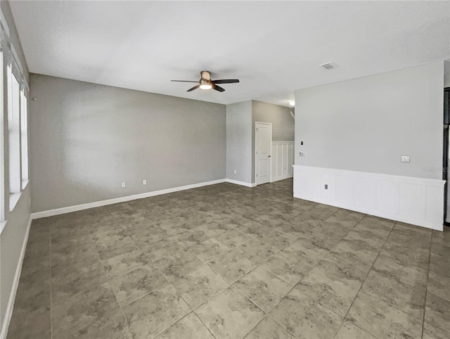 empty room featuring ceiling fan