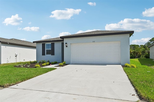 ranch-style home featuring a front yard and a garage