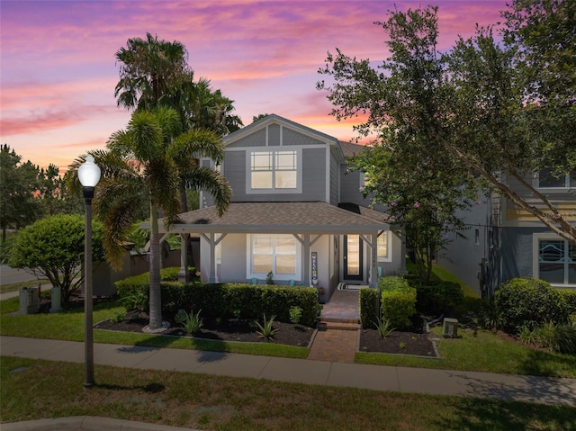 view of front of property featuring covered porch