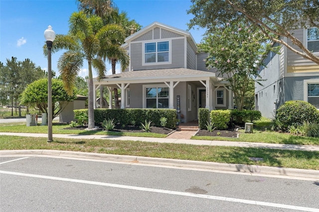 view of front of home featuring covered porch