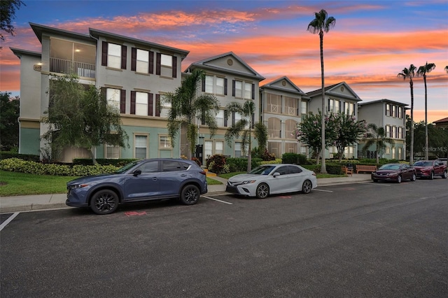 view of outdoor building at dusk