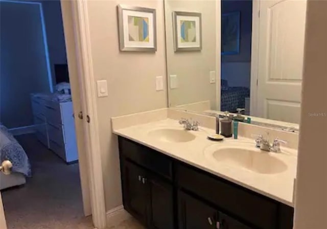 bathroom featuring dual vanity