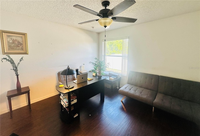 office with dark hardwood / wood-style flooring, a textured ceiling, and ceiling fan