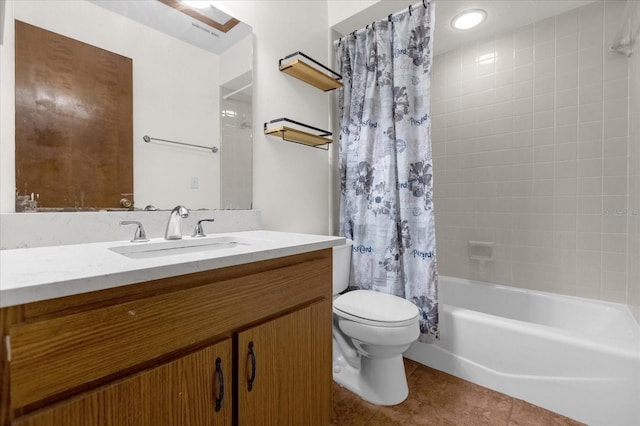 full bathroom with shower / tub combo with curtain, vanity, tile patterned floors, and toilet