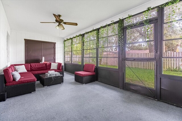 sunroom / solarium with ceiling fan