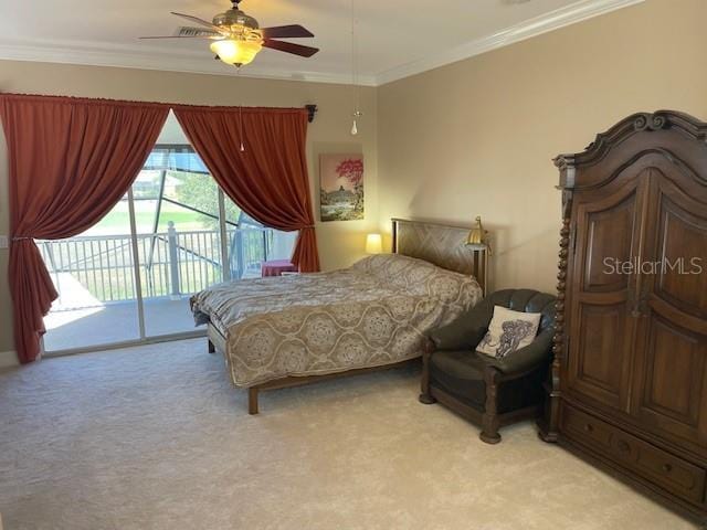 bedroom featuring ceiling fan, light colored carpet, ornamental molding, and access to outside