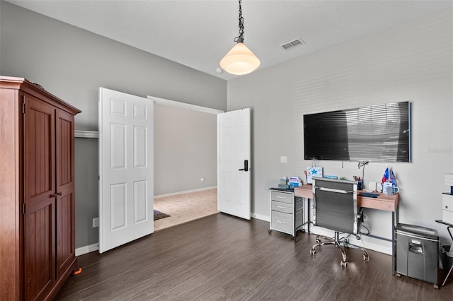 office with dark hardwood / wood-style floors