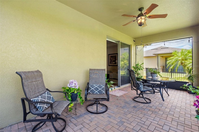 view of patio / terrace with ceiling fan