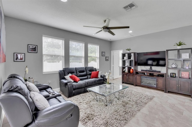 living room featuring ceiling fan