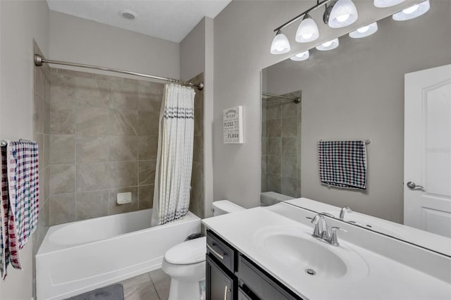 full bathroom featuring toilet, tile patterned floors, shower / bath combo, and vanity