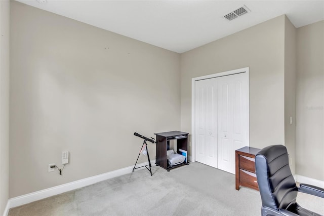 home office featuring light colored carpet