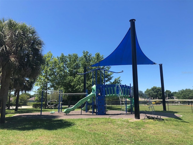 view of jungle gym featuring a yard