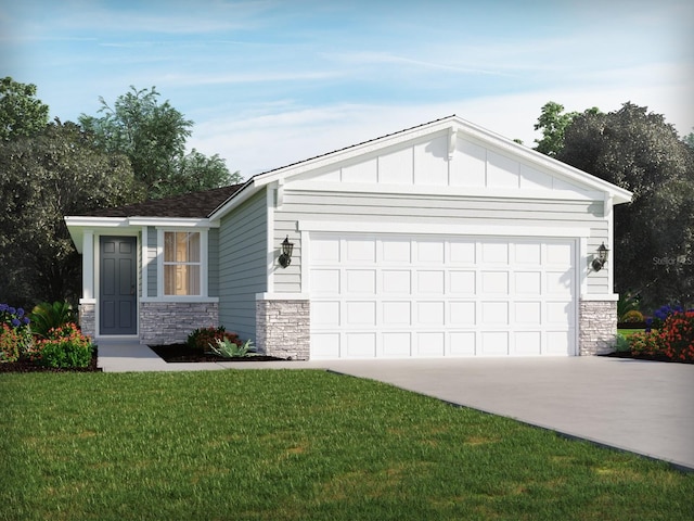 view of front facade with a front yard and a garage