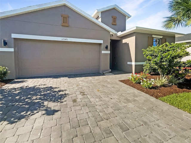 view of front of property with a garage