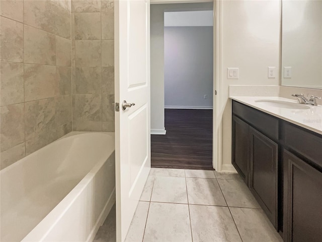 bathroom featuring tile patterned floors and vanity