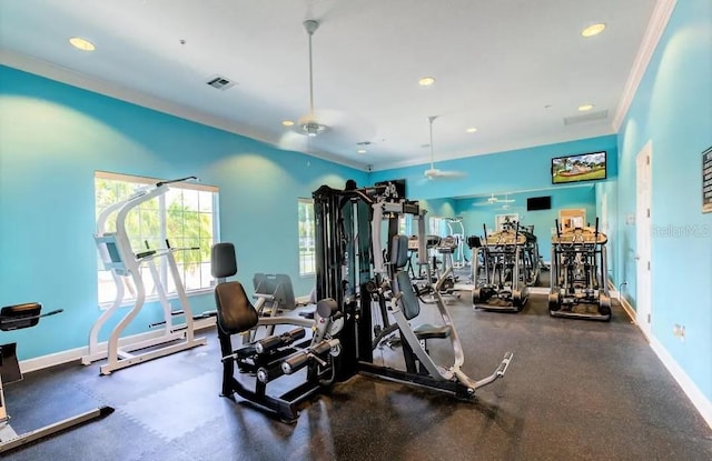 gym featuring crown molding