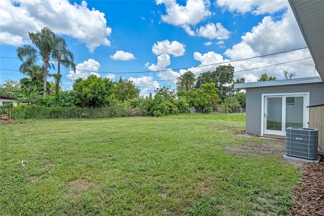 view of yard featuring central AC