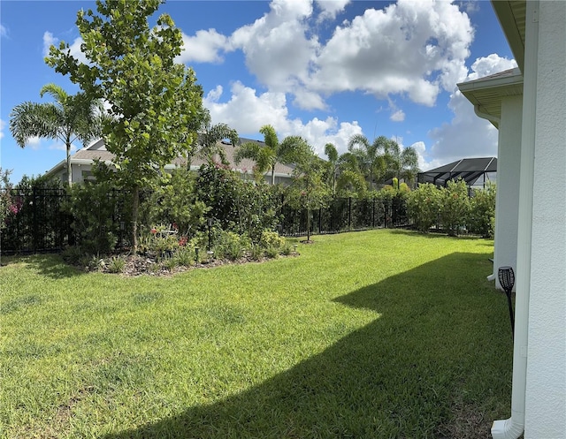 view of yard featuring a lanai