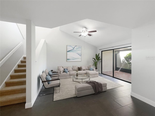 living room featuring ceiling fan and lofted ceiling