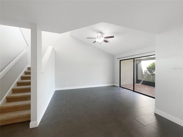 interior space featuring ceiling fan and lofted ceiling