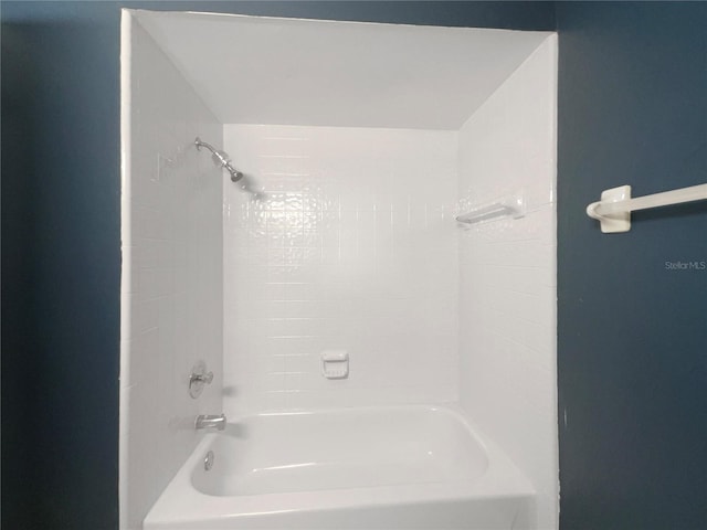 bathroom featuring  shower combination