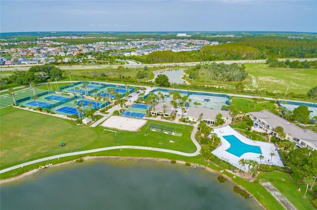 birds eye view of property with a water view