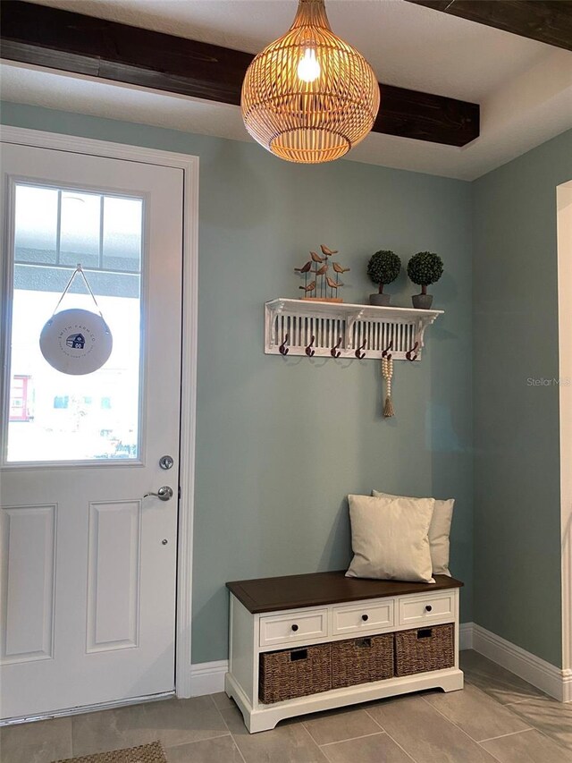 mudroom with tile patterned floors