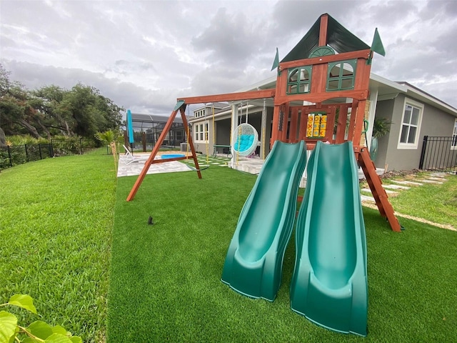 view of play area with a yard