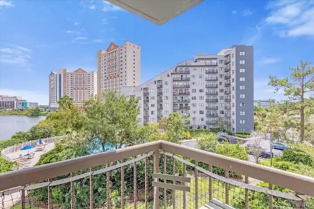 balcony featuring a water view