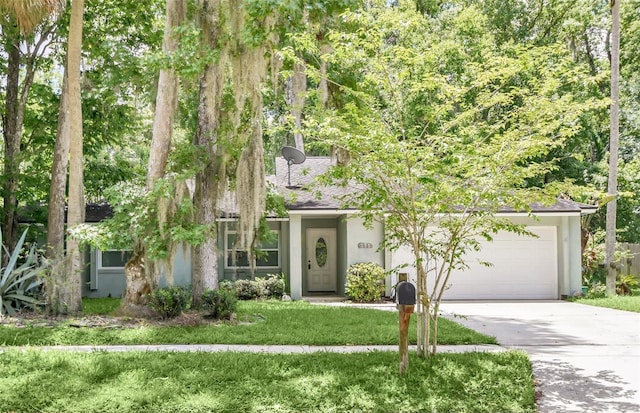 obstructed view of property featuring a garage