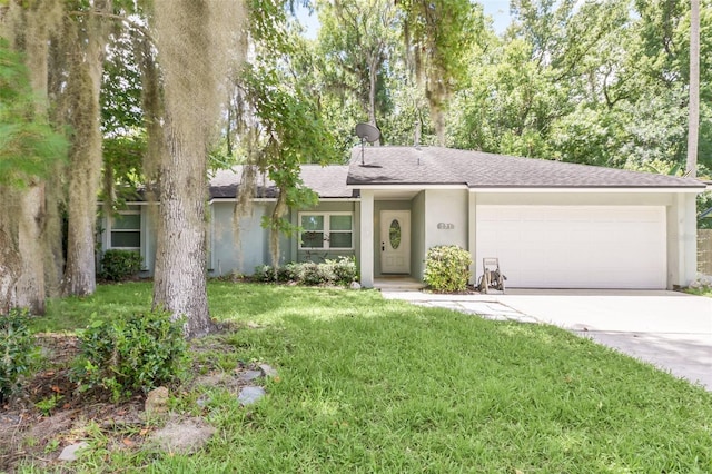 ranch-style home with a front yard and a garage