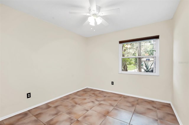 unfurnished room featuring ceiling fan and light tile patterned flooring