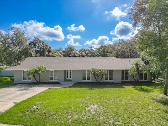 ranch-style house with a front yard