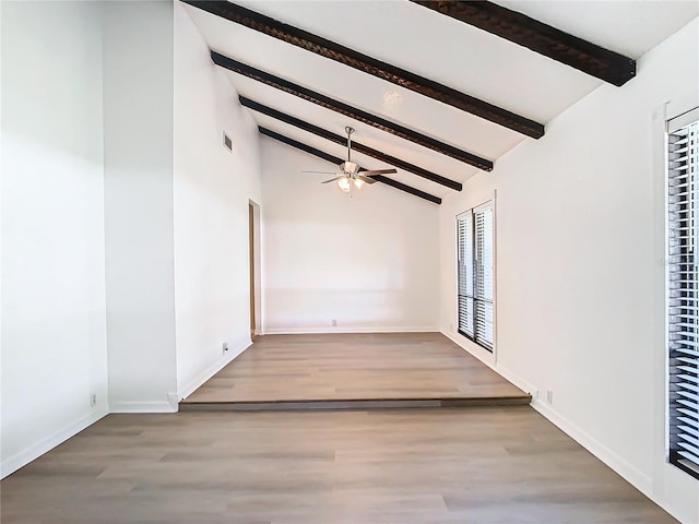 spare room featuring beamed ceiling, high vaulted ceiling, light hardwood / wood-style flooring, and ceiling fan