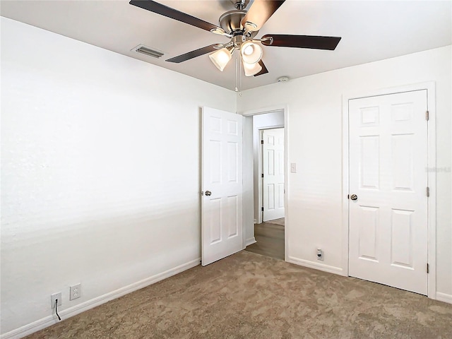 unfurnished bedroom with ceiling fan and light carpet