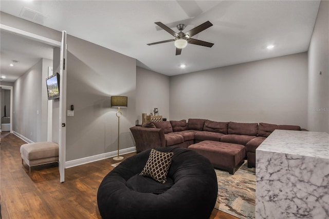 living room featuring recessed lighting, visible vents, dark wood-type flooring, a ceiling fan, and baseboards