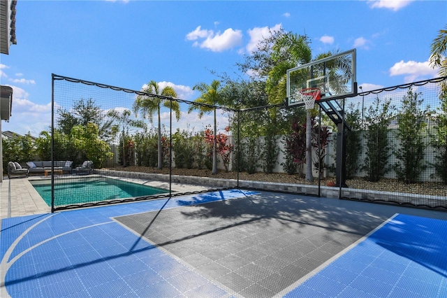 view of basketball court with community basketball court