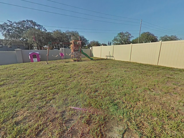 view of yard featuring a playground