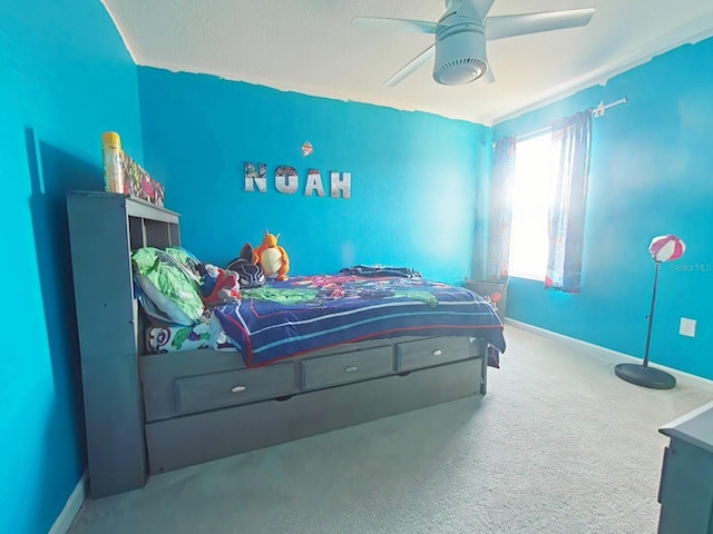 carpeted bedroom featuring ceiling fan