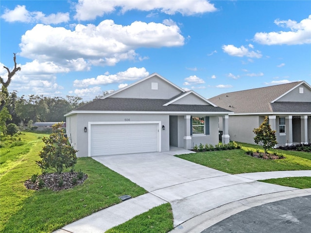 single story home with a garage and a front yard