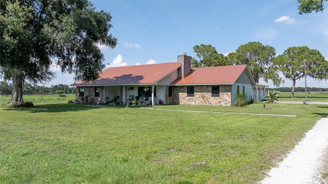 single story home featuring a front yard