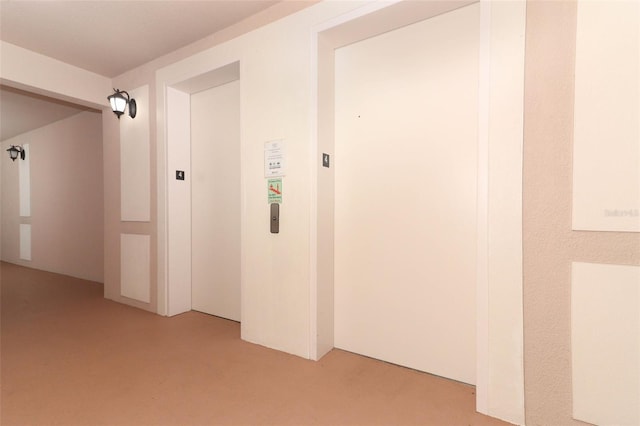 hallway featuring elevator