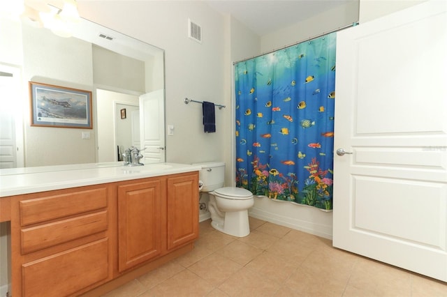 full bathroom featuring tile patterned floors, toilet, vanity, and shower / tub combo with curtain